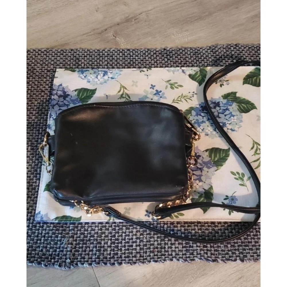 black faux leather crossbody purse. light weight. small